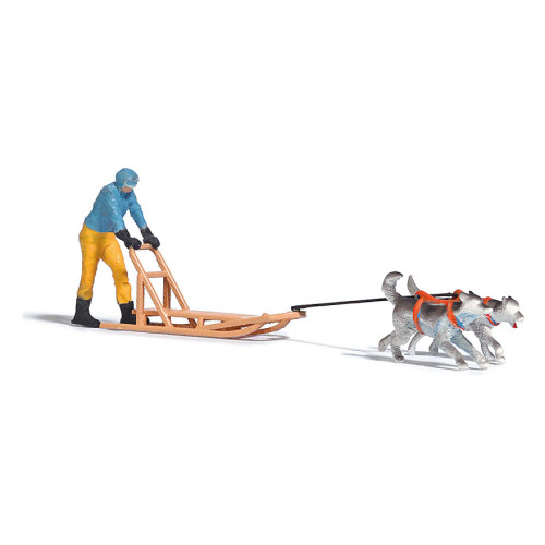 Busch H0 7817 persoon op Hondenslee voorgetrokken door 2 honden - Modeltreinshop