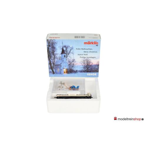 Marklin H0 48404 Lagenboord wagen beladen met een blauwe slee, de kerstman en twee rendieren. - Modeltreinshop